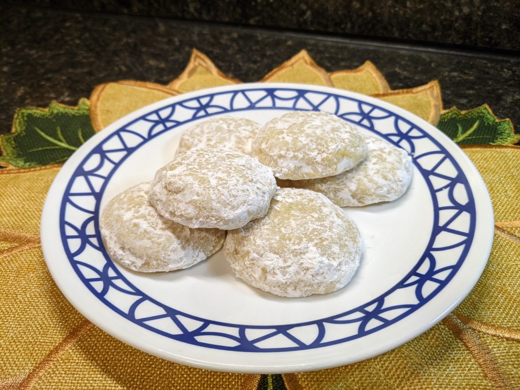 Lemon cookies with powdered sugar.