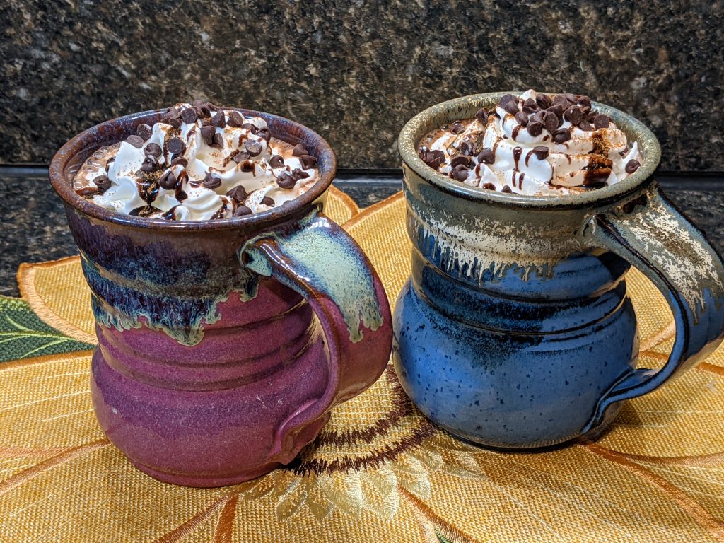 Delicious mugs of homemade hot cocoa.