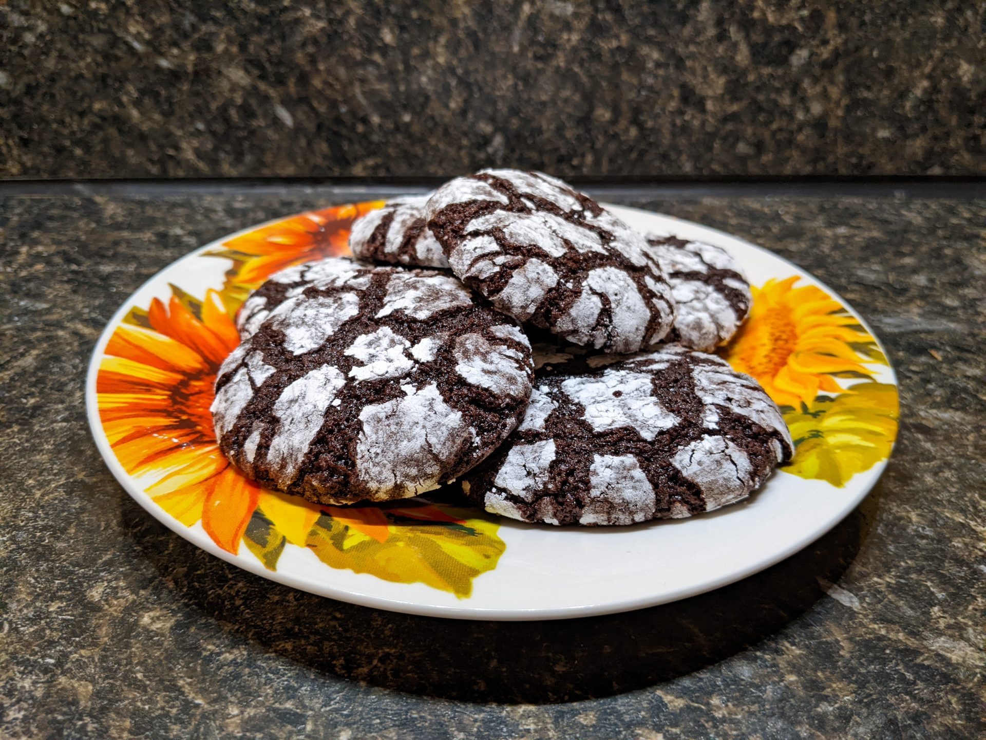 A plate of cocoa crinkle cookies.